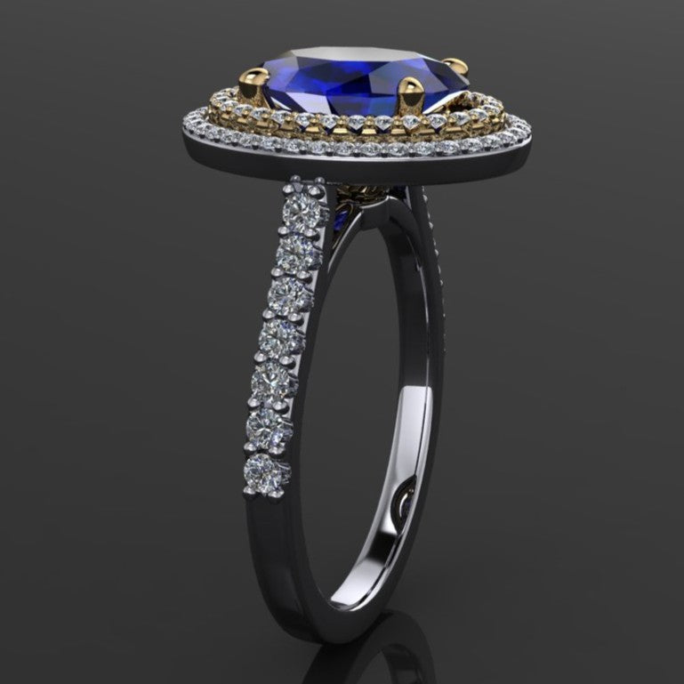 2.5 carat oval blue moissanite ring with a double halo with diamonds - side view