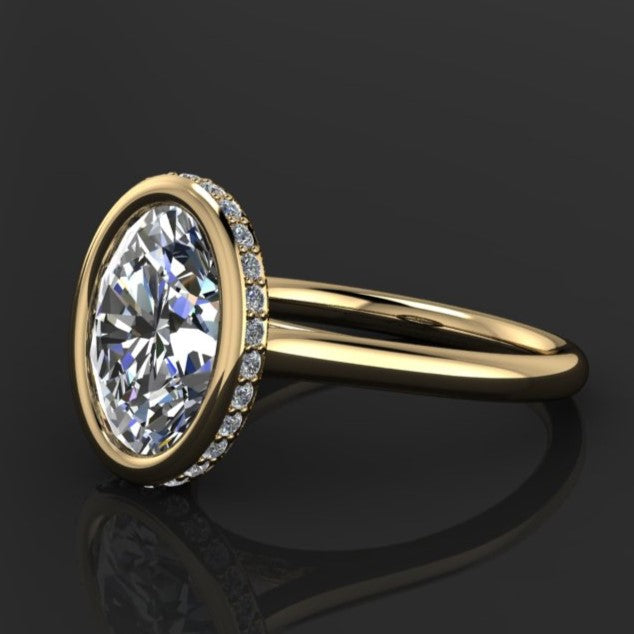 2 carat oval lab grown diamond, bezel set side halo engagement ring, 14k yellow gold 