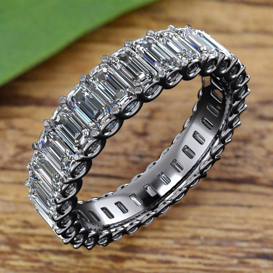 chanel ring - emerald cut moissanite eternity band in platinum - angle view