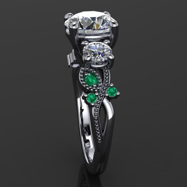 1.5 carat round three stone ring with green moissanite accent stones - second side view