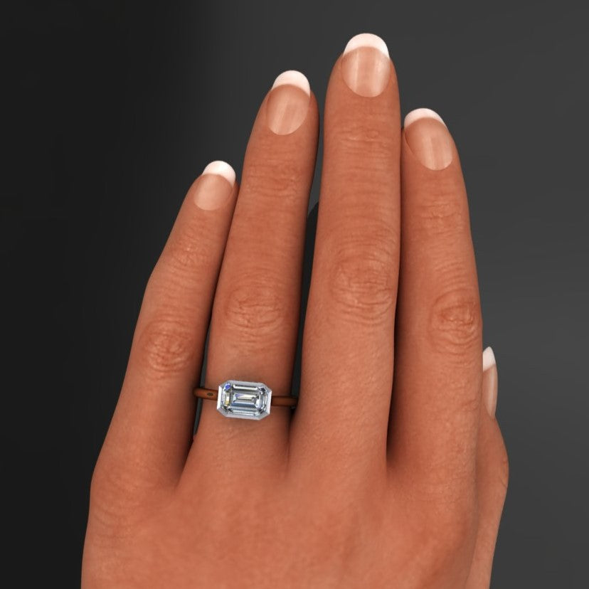 2 carat emerald lab grown diamond, diamond side halo bezel engagement ring, model shot