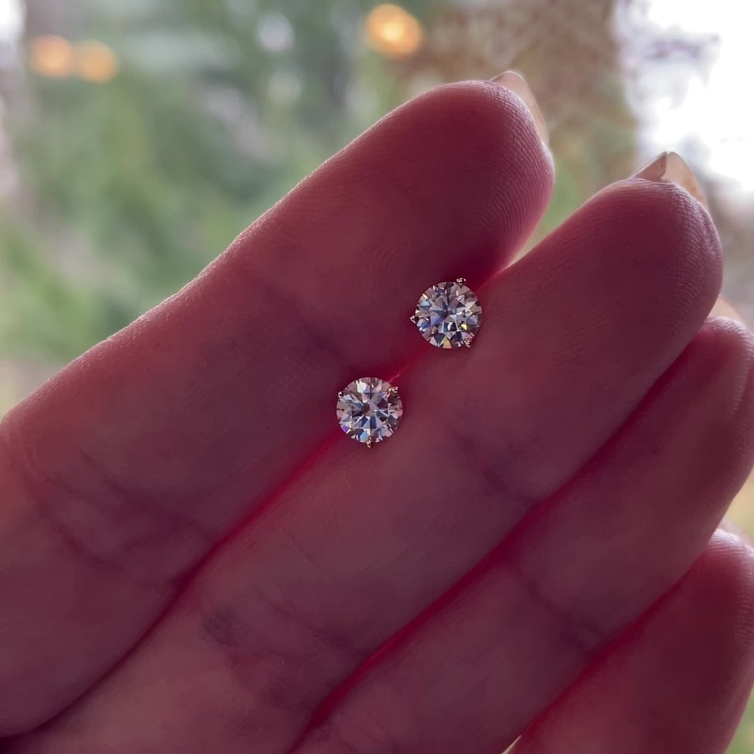 video of 1 carat round moissanite earrings, 14k yellow gold earrings - J Hollywood Designs