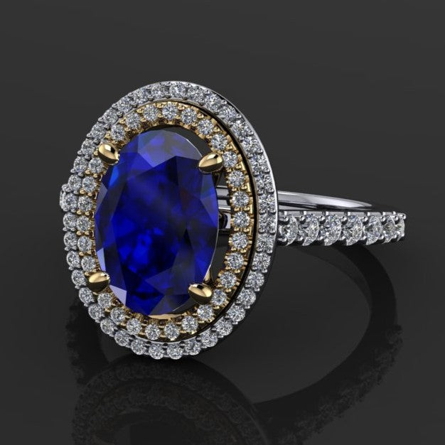 2.5 carat oval blue moissanite ring with a double halo with diamonds