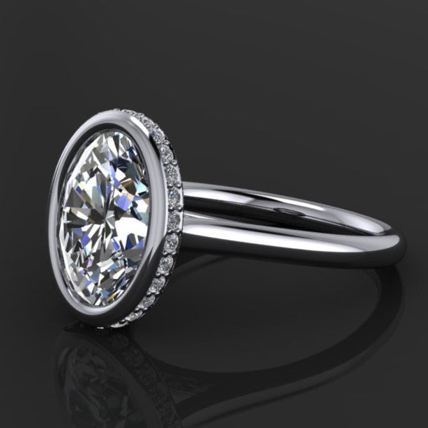 2 carat oval lab grown diamond, bezel set side halo engagement ring, platinum