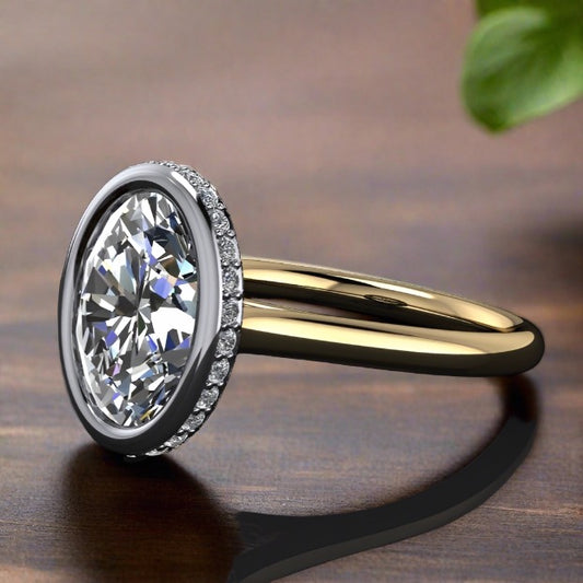 2 carat oval lab grown diamond, bezel set side halo engagement ring