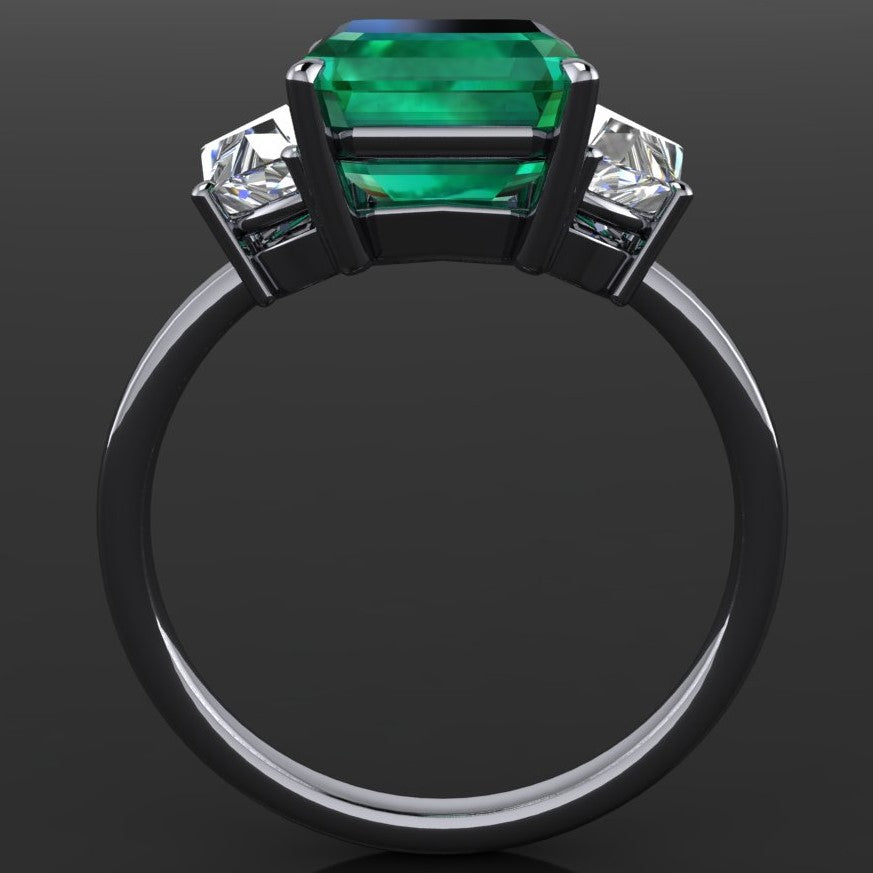 3.5 carat green emerald three stone ring, profile view