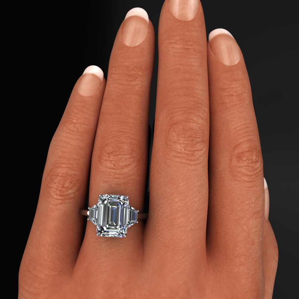 demi ring - 4.3 carat emerald cut and trapezoid engagement ring, side halo - model shot
