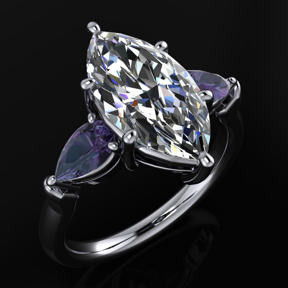 2 carat marquise moissanite three stone ring with lab created alexandrite side stones  on a black background
