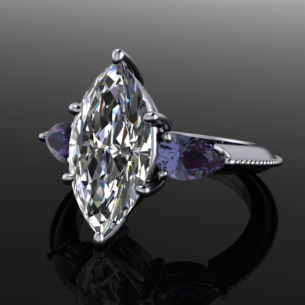 2 carat marquise moissanite three stone ring with lab created alexandrite side stones  on a reflective surface