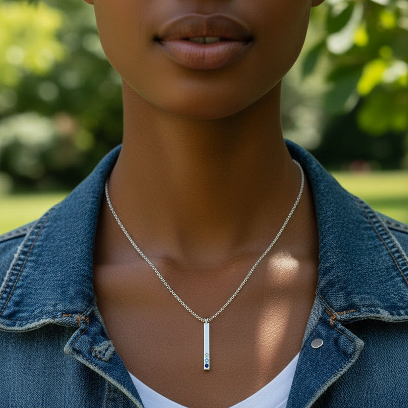Vertical bar style necklace with 3 birthstones on an 18" cable chain.