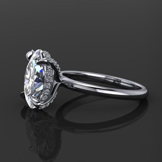 3 carat lab grown diamond oval solitaire engagement ring with a diamond hidden halo and studded prongs