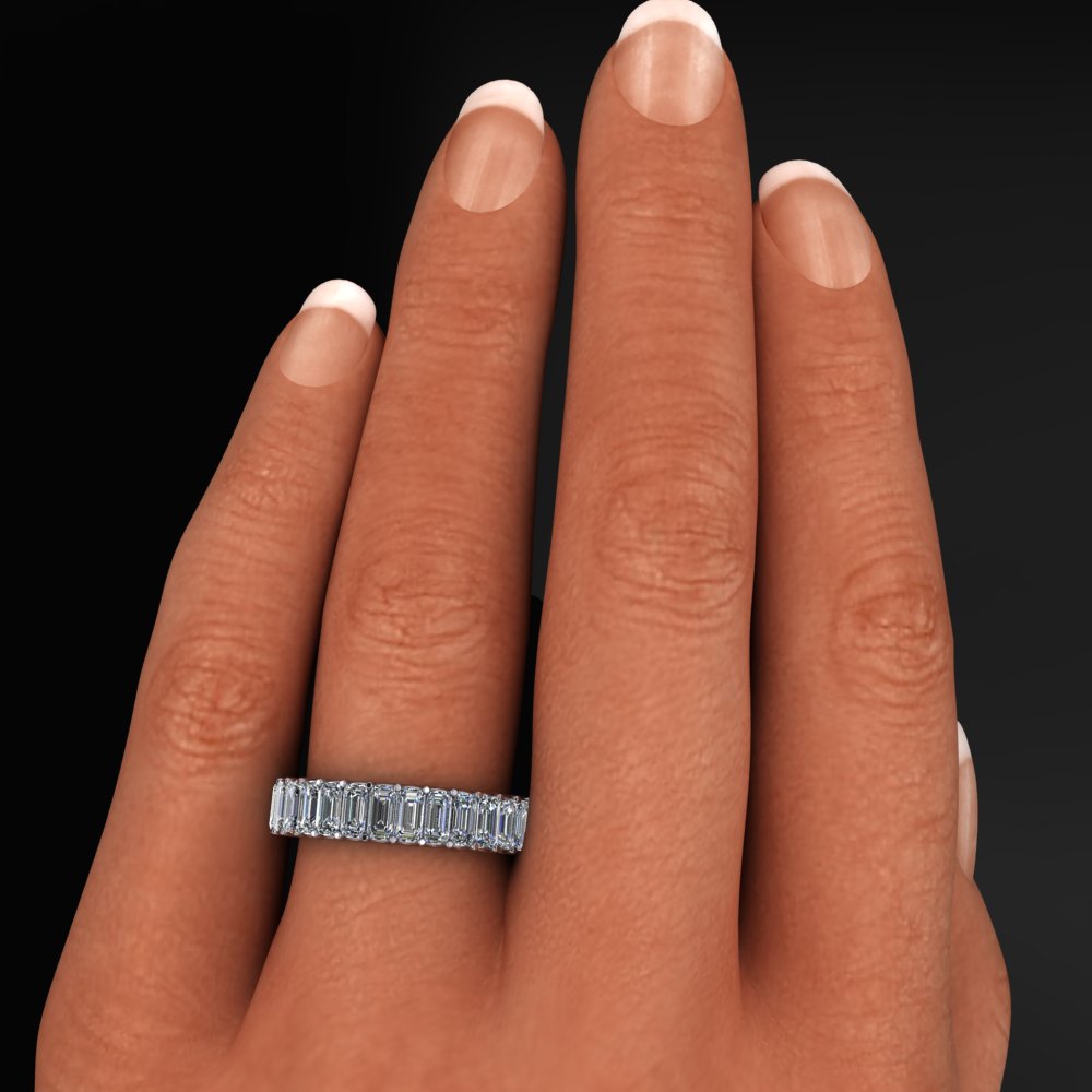 chanel ring - emerald cut moissanite eternity band in platinum - model hand shot