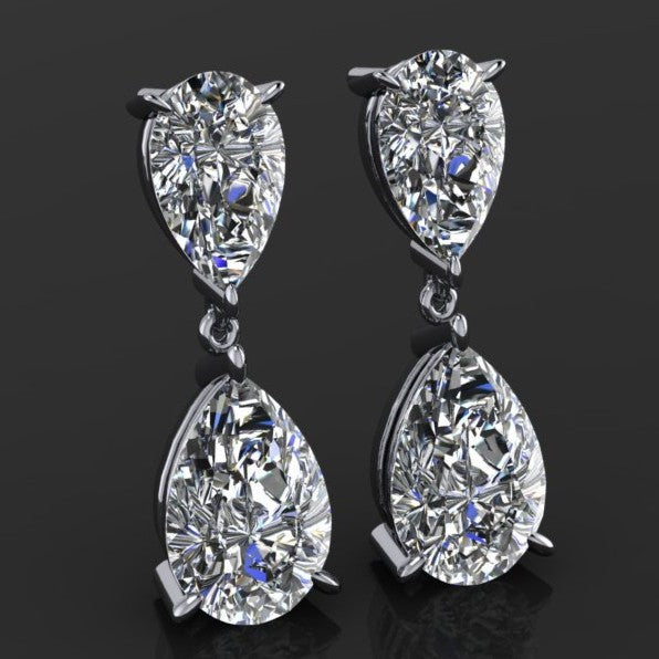 5 carat pear sophia richie dangle on a black background