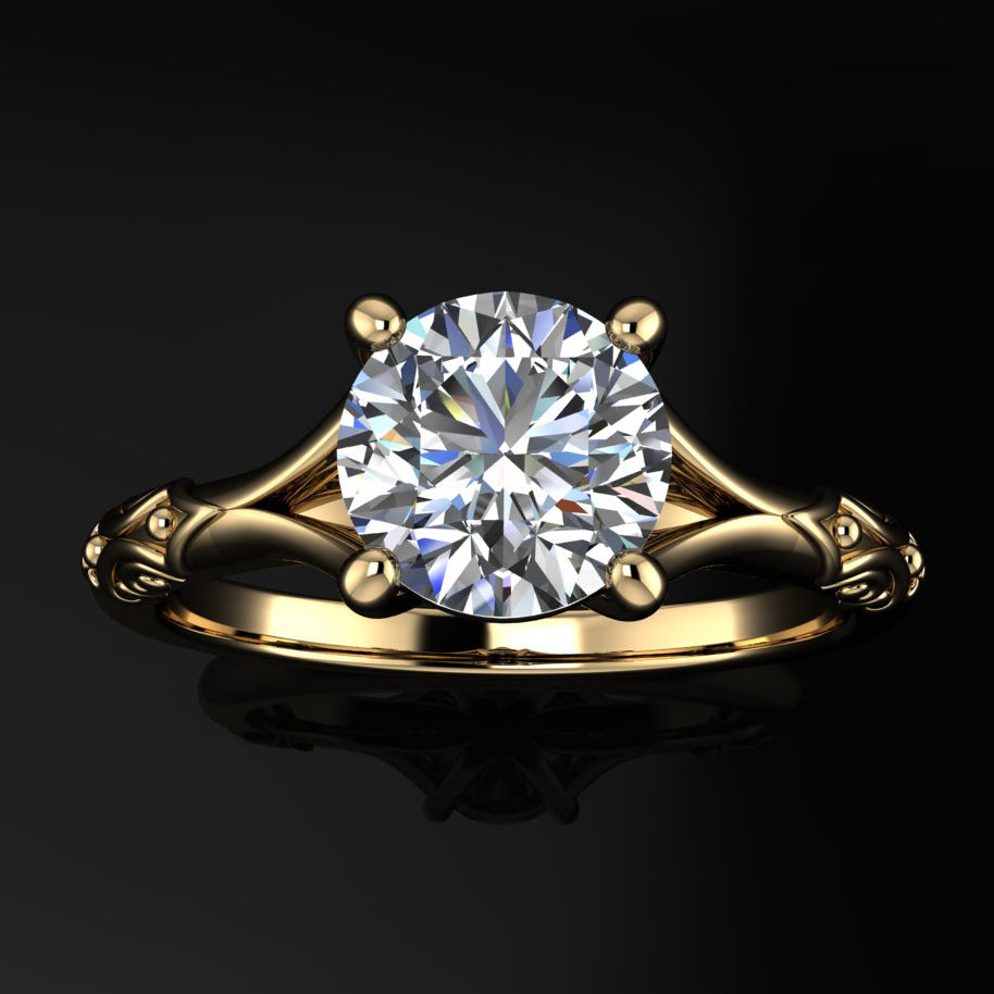 round moissanite engagement ring with pretty detailing on the sides of the band - top view