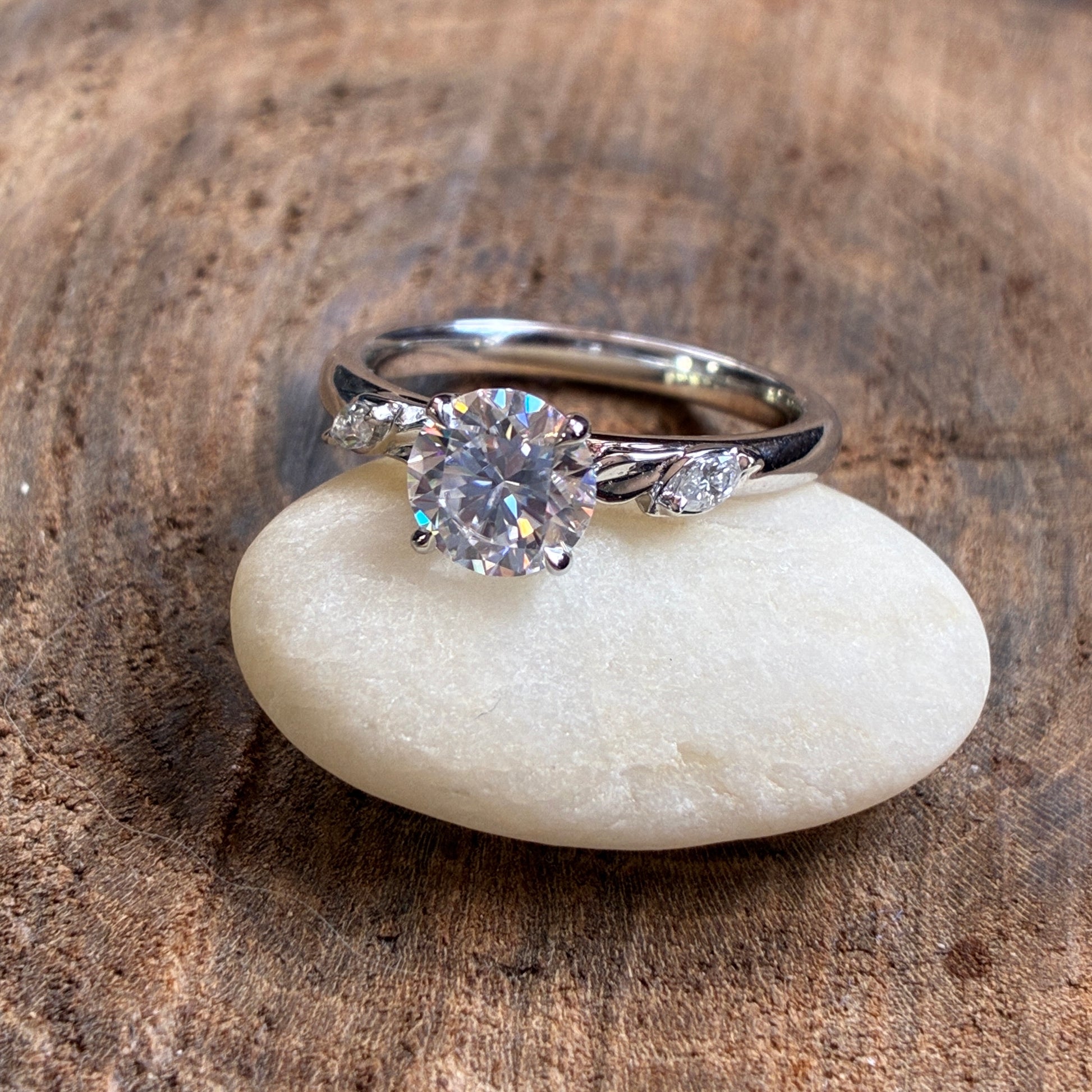 1 carat round moissanite engagement ring, ZAYA moissanite leaf ring, secret garden ring, nature inspired - photo of the actual ring on a rock