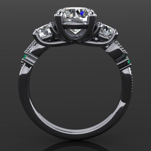 1.5 carat round three stone ring with green moissanite accent stones - profile view