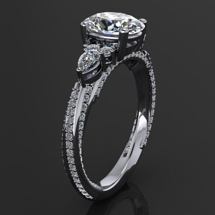 1.8 carat oval moissanite ring with lab grown diamond accent stones on a wooden surface - side view