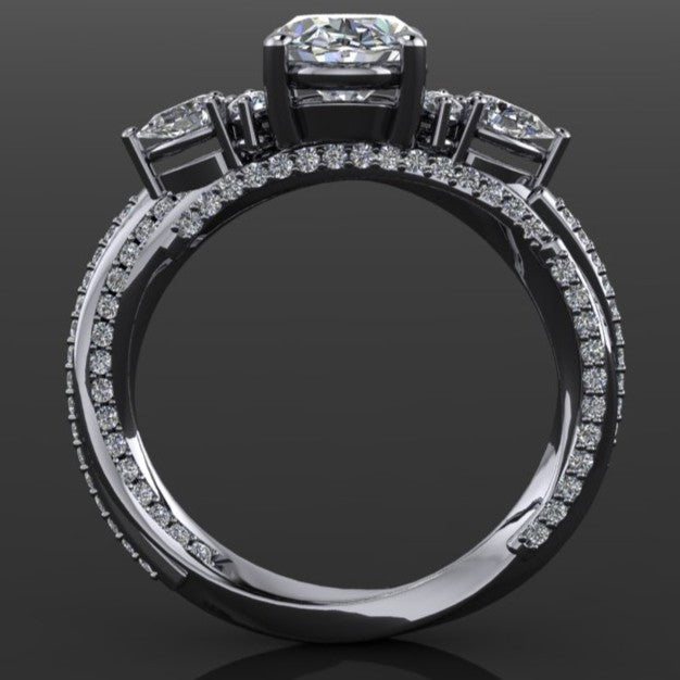 1.8 carat oval moissanite ring with lab grown diamond accent stones on a wooden surface - profile view