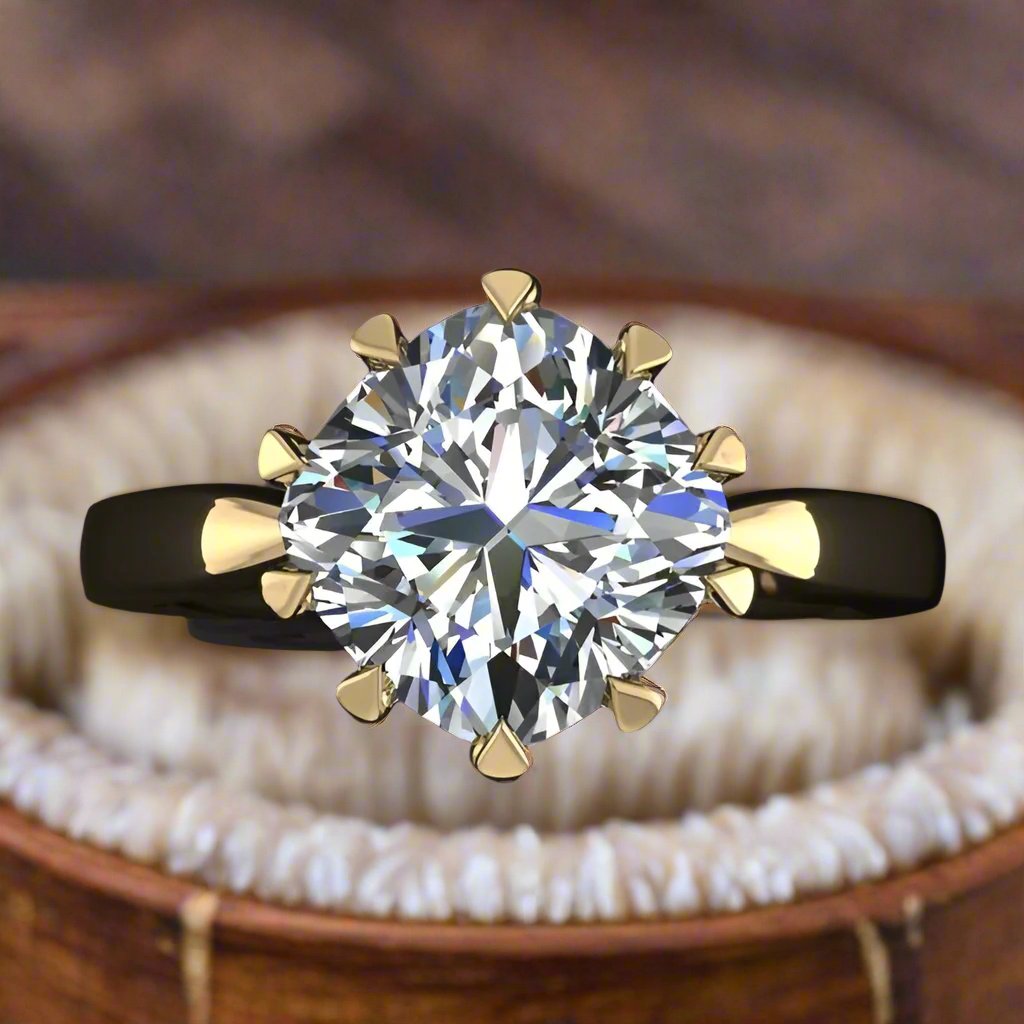 The Lady Danbury ring featuring a 2.5 carat old mine cut cushion moissanite center. A solitaire ring with 10 prongs, vintage ring box view