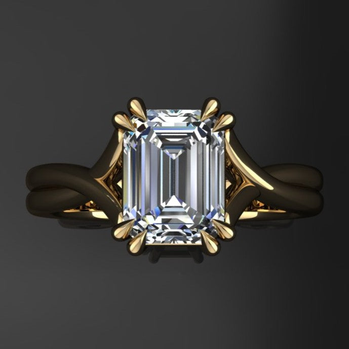 2 carat emerald solitaire ring with a 3.5mm wide band and double claw prongs - top view