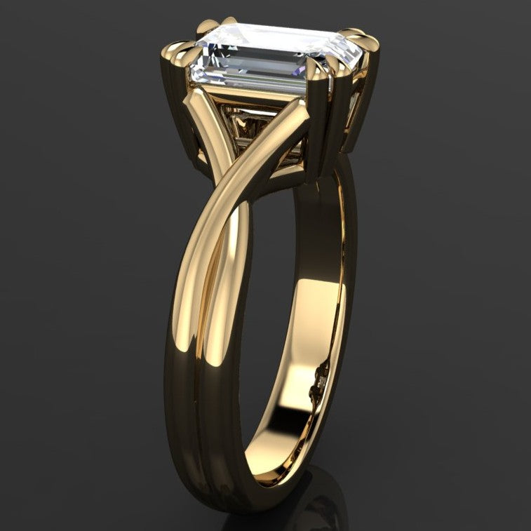 2 carat emerald solitaire ring with a 3.5mm wide band and double claw prongs - side view
