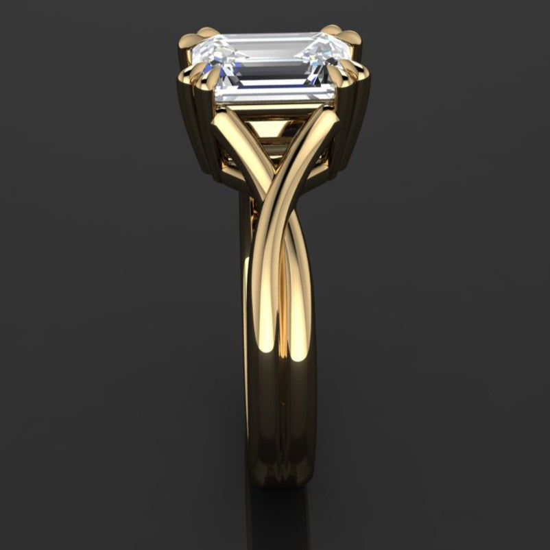 2 carat emerald solitaire ring with a 3.5mm wide band and double claw prongs - second side view