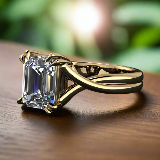 2 carat emerald solitaire ring with a 3.5mm wide band and double claw prongs