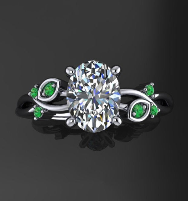 1.5 carat oval engagement ring with leaves and green sapphires - top view