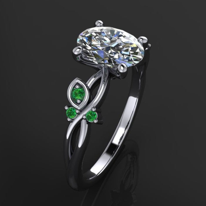 1.5 carat oval engagement ring with leaves and green sapphires - angle view