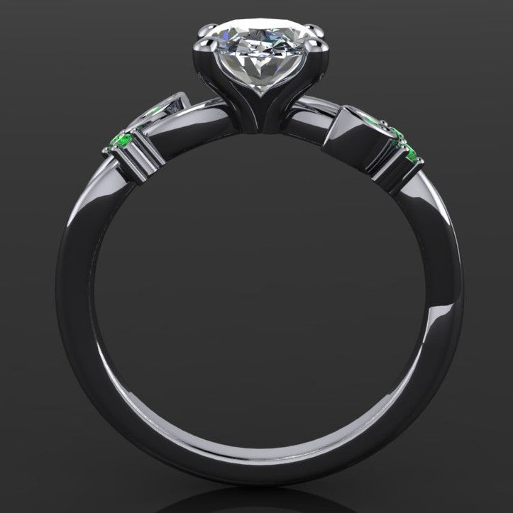1.5 carat oval engagement ring with leaves and green sapphires - profile view