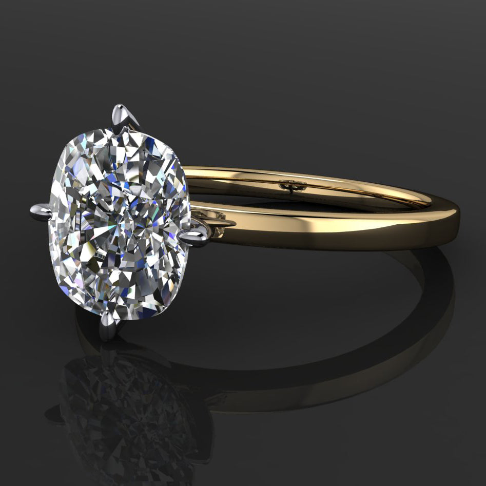 2 carat elongated cushion solitaire ring set with north, south, east, west prongs - laying down view