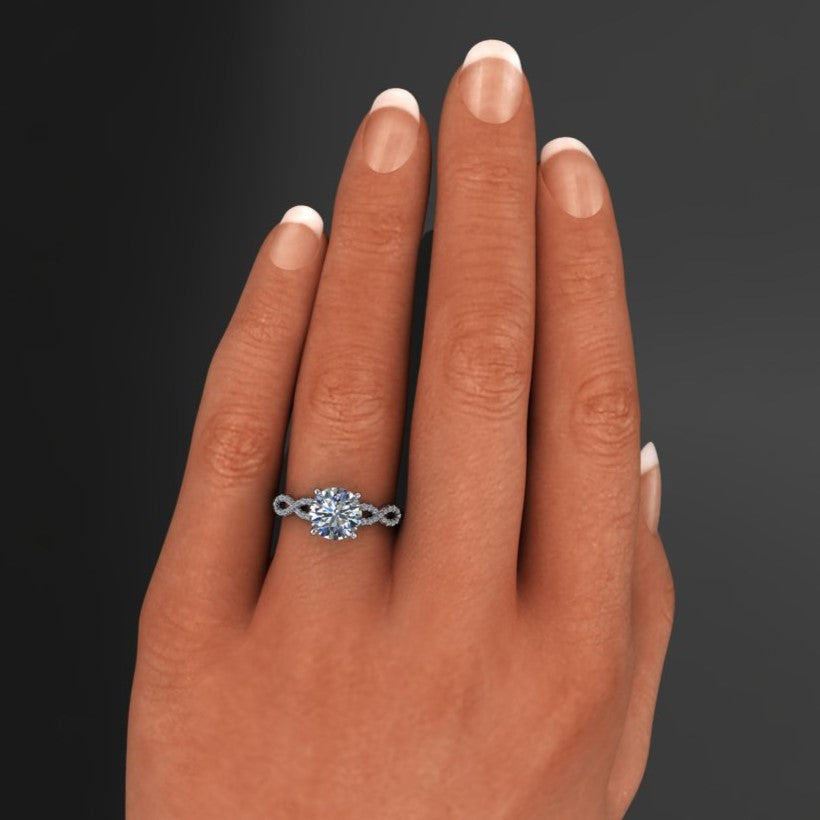 2.7 carat round moissanite infinity engagement ring hand model pic