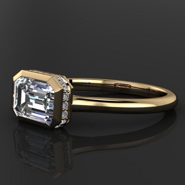2 carat emerald lab grown diamond, diamond side halo bezel engagement ring, profile view 14k yellow gold