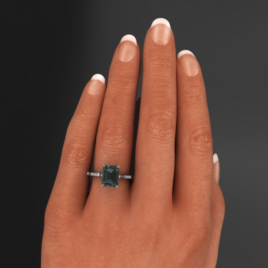 2.5 carat gray criss cut emerald moissanite and diamond ring, hand model