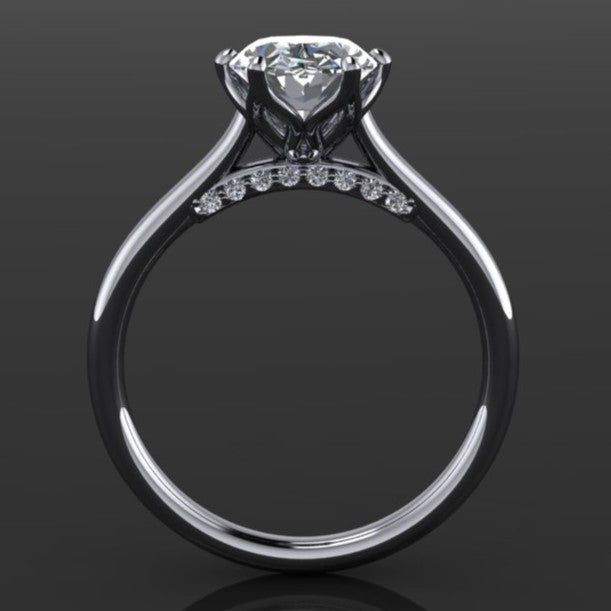 Darby ring - oval engagement ring with a moissanite center and diamonds on the bridge - side view
