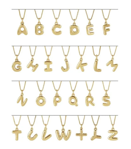 Gold letter necklaces from A to Z on a white background