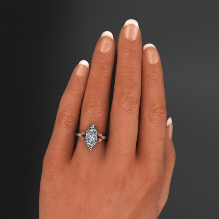 3 carat hexagon moissanite engagement ring with orange sapphire side stones, hand model