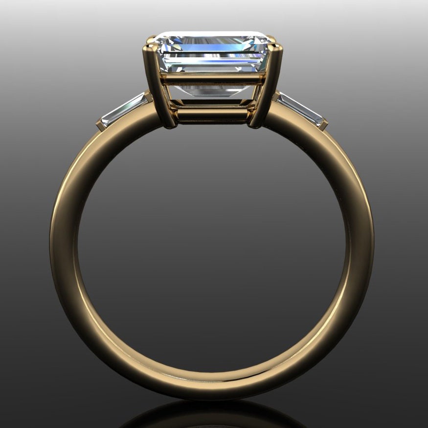 1.5 carat lab grown diamond emerald cut engagement ring, east west engagement ring, three stone ring - profile view