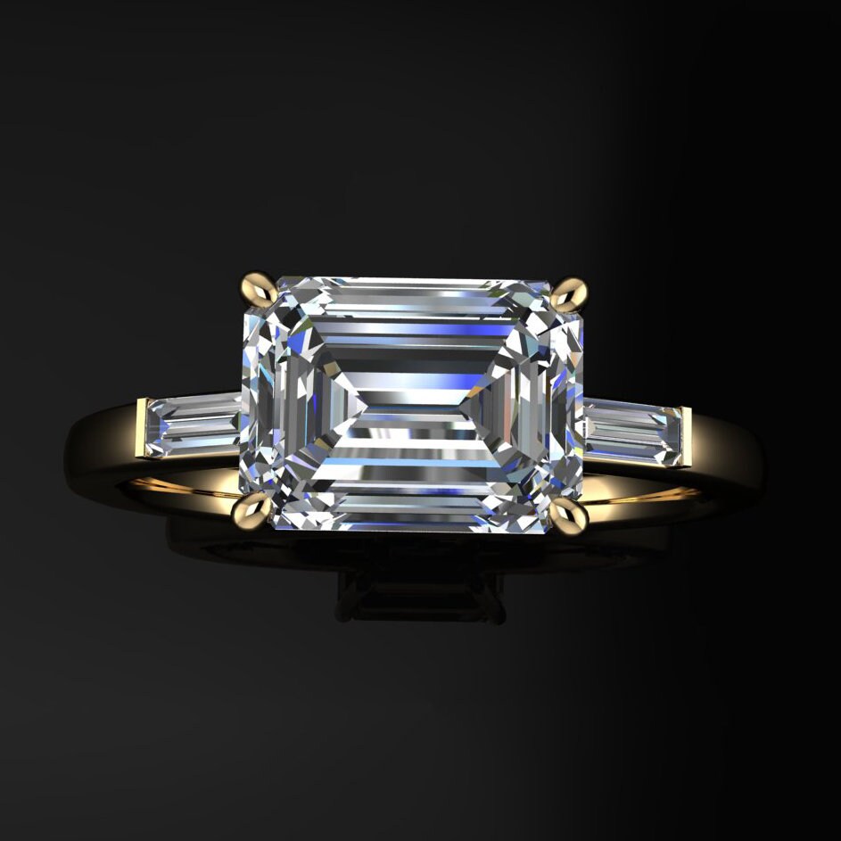 1.5 carat lab grown diamond emerald cut engagement ring, east west engagement ring, three stone ring - top view