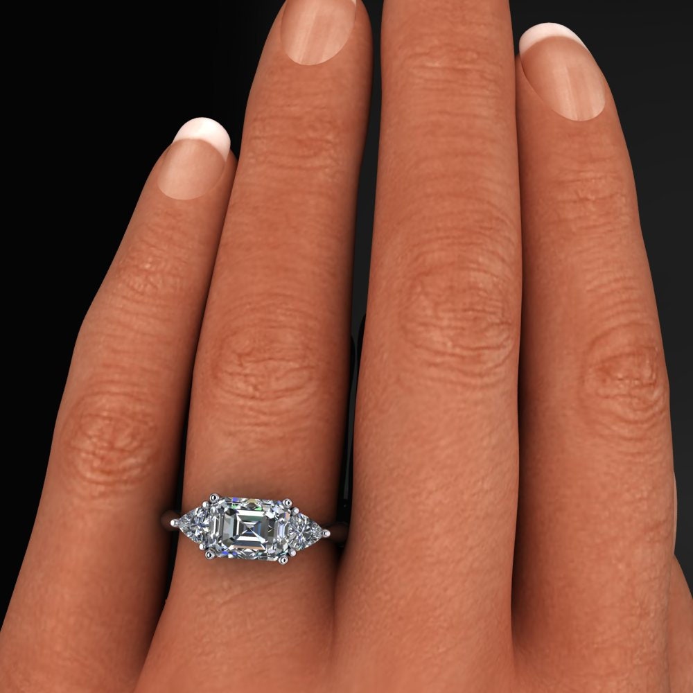 Erin ring - emerald cut 3 stone lab grown diamond engagement ring - model shot