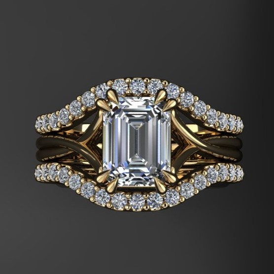 1.75 carat emerald cut lab grown diamond. G color, VS1 clarity, solitaire engagement ring with a split band and double claw prongs = with wedding bands