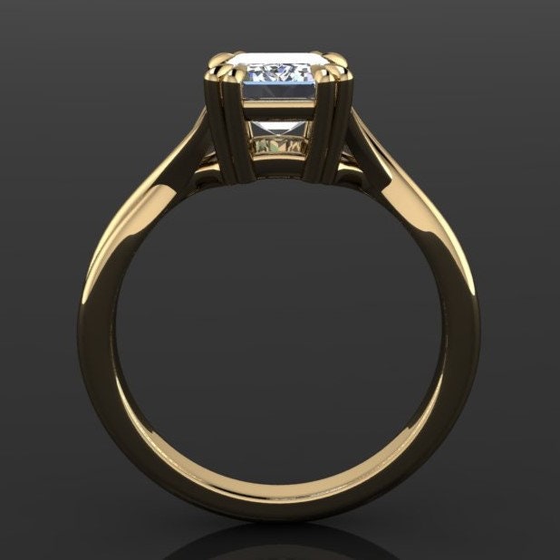 1.75 carat emerald cut lab grown diamond. G color, VS1 clarity, solitaire engagement ring with a split band and double claw prongs - profile view.