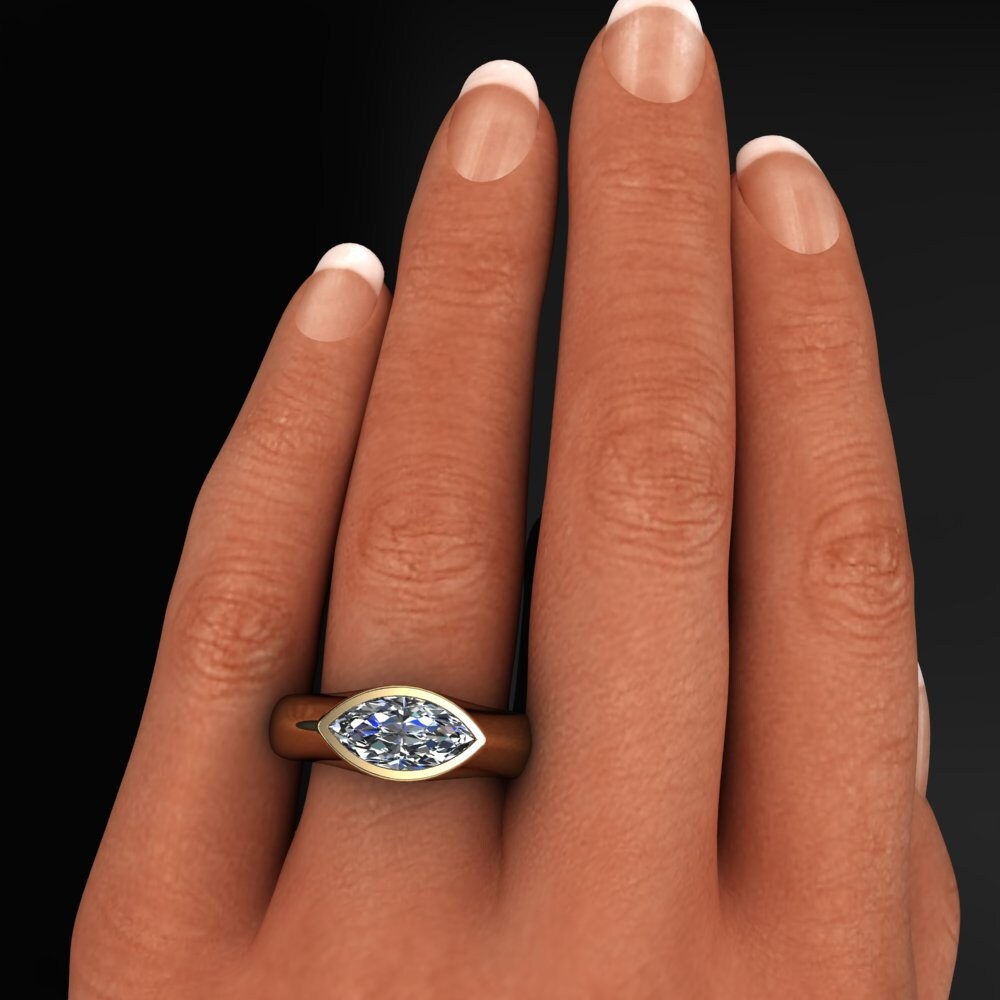 Dakota ring - yellow gold ring set with a 1.5 carat lab grown diamond marquise -model shot
