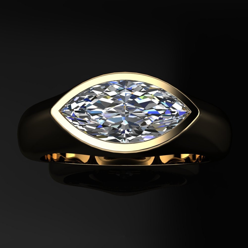 Dakota ring - yellow gold ring set with a 1.5 carat lab grown diamond marquise -top view