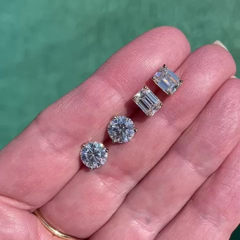 video of 2 carat emerald stud earrings