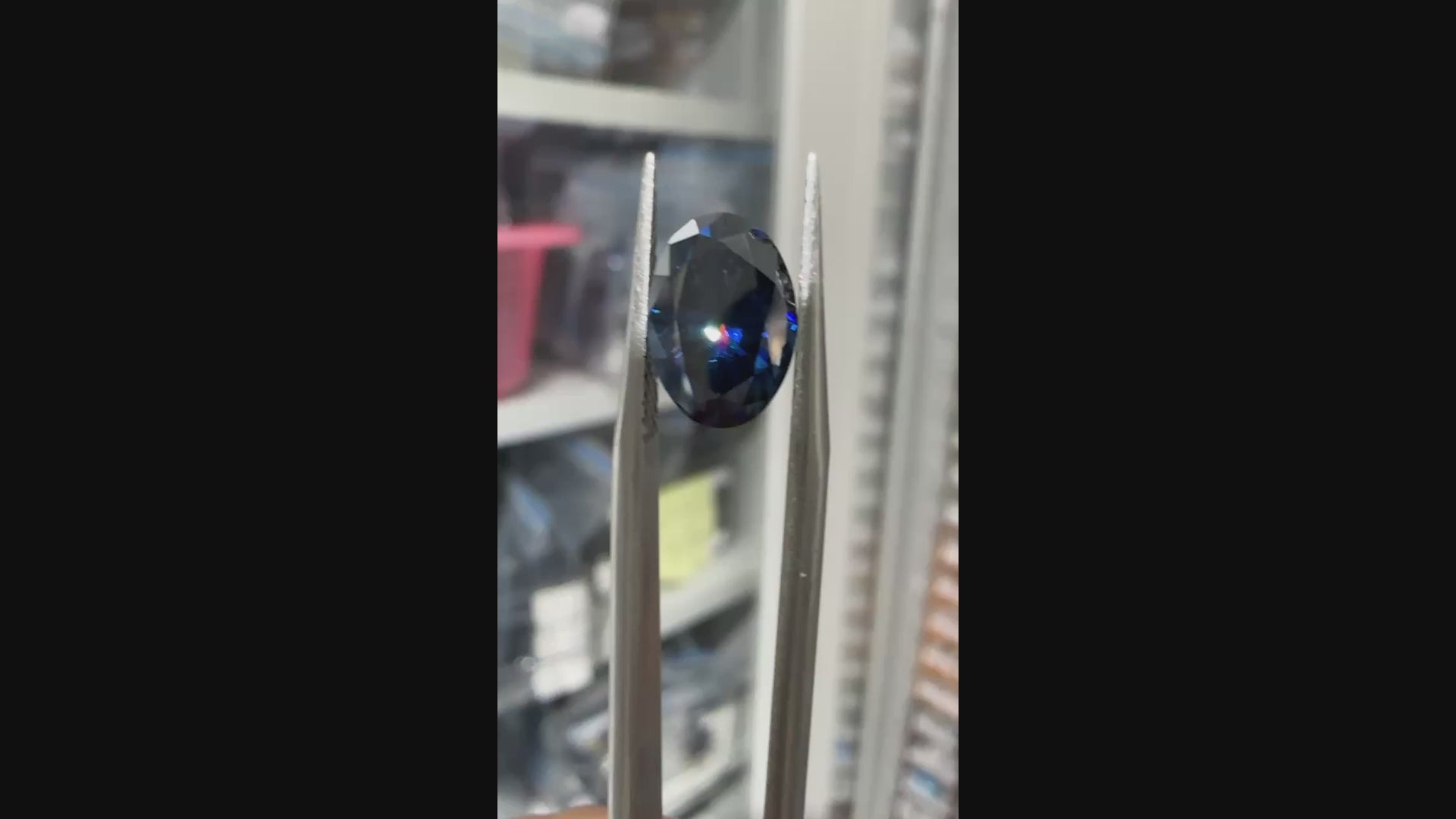 video of oval blue moissanite stone