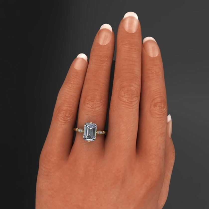 10x7 elongated emerald cut moissanite celia ring, hand model view