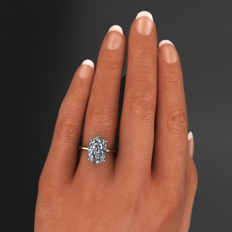 4 carat elongated oval cut ZAYA moissanite engagement ring on hand model - naked shay ring - J Hollywood Designs
