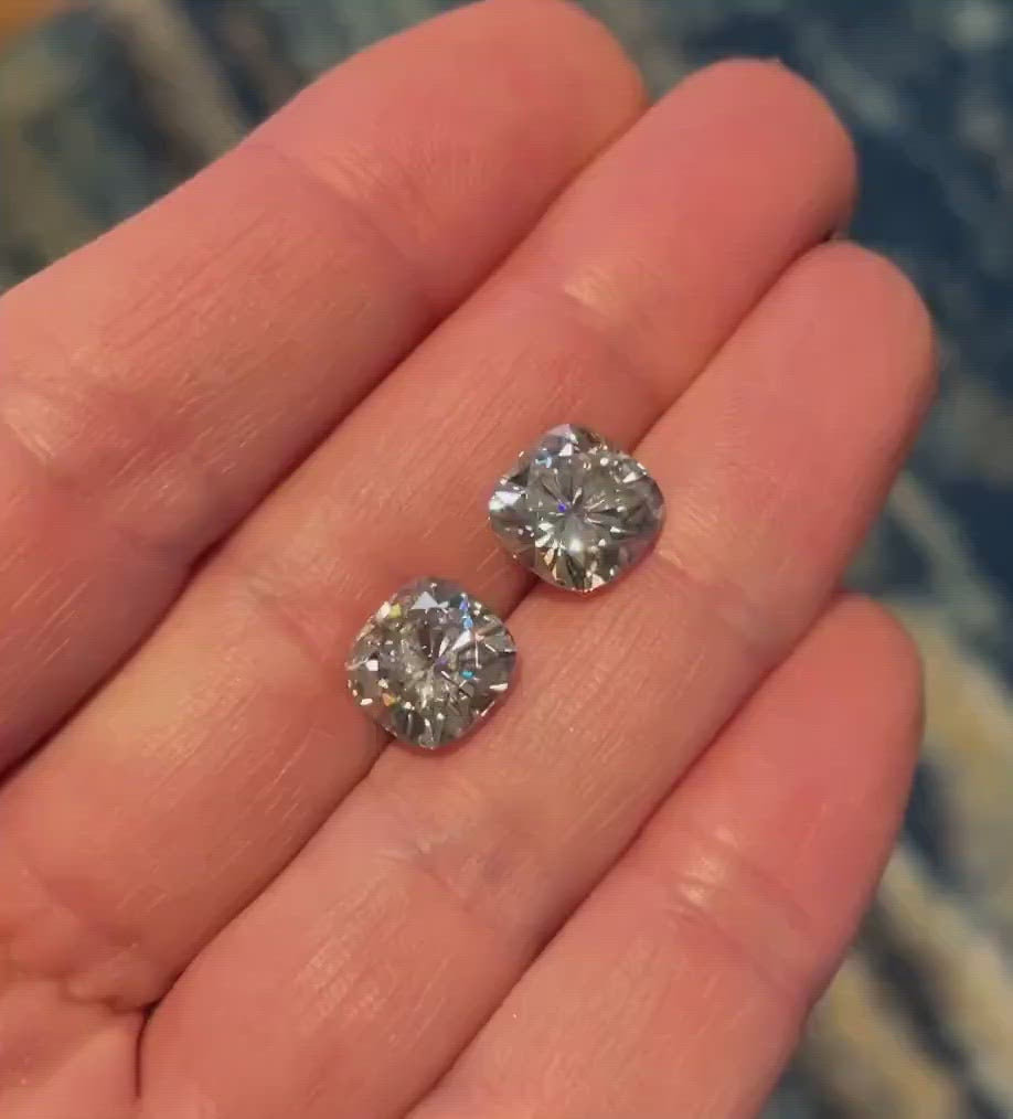 video of loose cushion cut moissanite