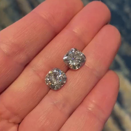 video of 2 large loose cushion shaped moissanite stones